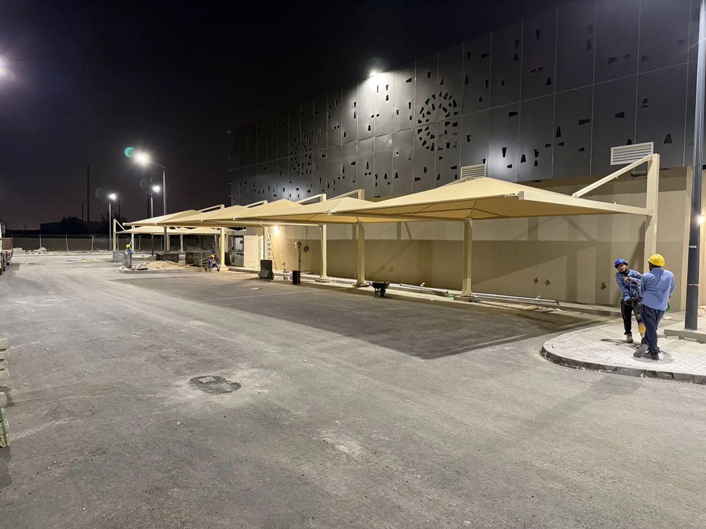 Fabric-covered cantilever shades beside Building 3191, Dhahran Aramco Building 3191